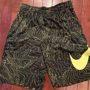 Nike Black Athletic Shorts with Neon Yellow Graphic and Large Swoosh
